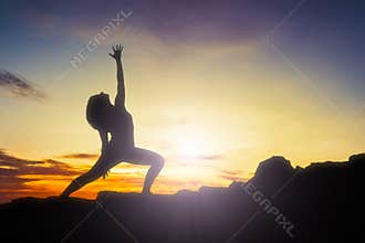 Yoga woman sunrise