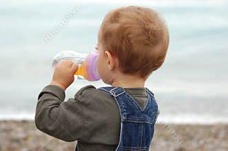 Young boy drink water