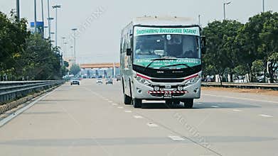 25 Feb 2024- Tourist Bus travelling with other vehicles on Yamuna Expressway.