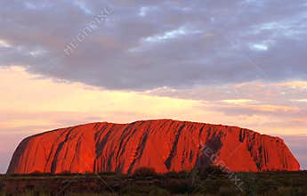 Uluru Ayers Rock (Unesco) is on fire at sunset, Australia