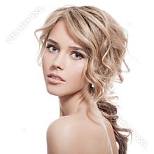 Beautiful Blonde Girl. Healthy Long Curly Hair.