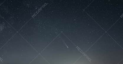 Starry night sky with stars and comet Tsuchinshan Atlas Astronomy Time lapse Background