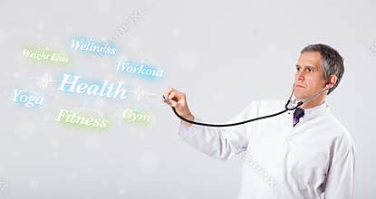 Clinical doctor pointing to health and fitness collection of words