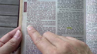 John 3:16 passage from the Book of John, New Testament of the Holy Bible.