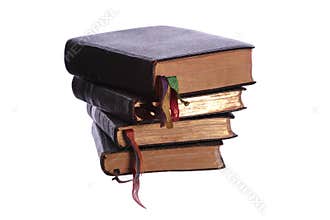 Stack of four old books