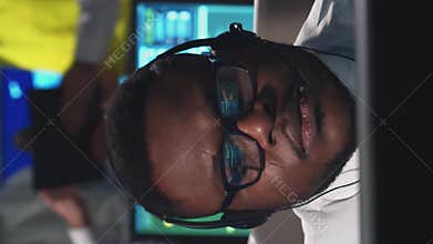 Workplace of the air traffic controllers in the control tower. Team of professional aircraft control officers works