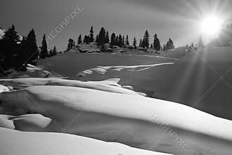 Austrian Mountain, Winter Landscape in High Resolution With a Shining Sun in the Background.