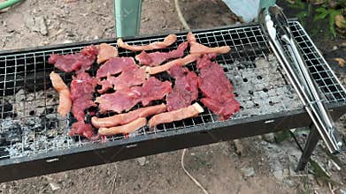 Dried Pork Fried , Pork Only One Shine , charcoal grill , street Thai food.
