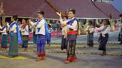 Thai people, Thai folk dancer parade Pavilion at a wat par Lahansai temple , 31 January 2024 , Buriram Thailand.