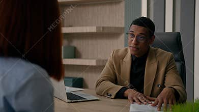 Business meeting in office African American businessman employer HR manager consultant recruiter consulting customer