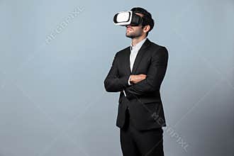 Smart business man crossing arms and standing at white background. Deviation.