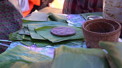 Grilling sticky rice sesame sesame local Shan Tai yai food Chiangmai Thailand Southeast Asia banana leaf eco friendly package