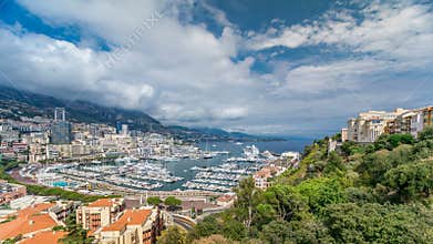 Monte Carlo city aerial panorama timelapse. View of luxury yachts and apartments in harbor of Monaco, Cote d'Azur.