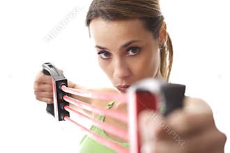 Woman doing fitness exercise with rubber band