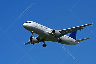 Airplane on blue sky