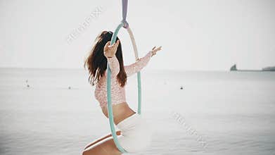 Woman on a aerial hoop