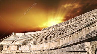 Roman Theatre in Amman, Jordan . Against the sunset. 4K, time lapse