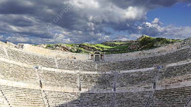 Roman Theatre in Amman, Jordan. Against the sky with clouds. 4K, time lapse