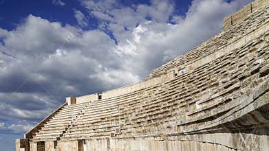 Roman Theatre in Amman, Jordan. Against the sky with clouds. 4K, time lapse