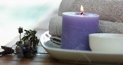 Beauty treatment in bowl presented on plate with dried lavender