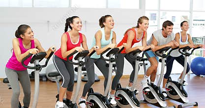 Spinning class in fitness studio