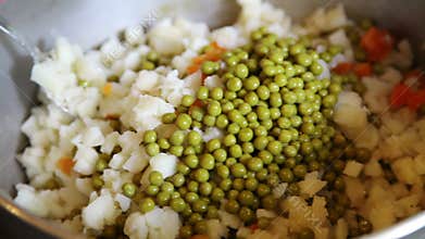 Mixing vegetarian salad