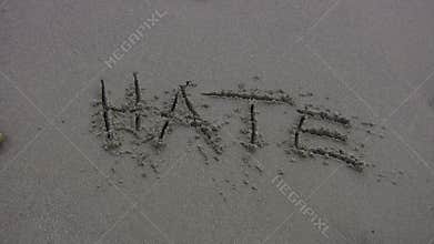 HATE' Washed Away on the Beach