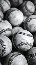 Pile of Vintage Baseball Balls in Black and White