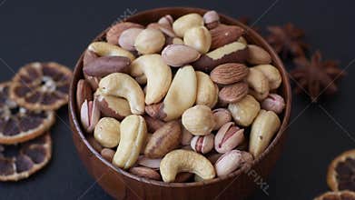 A mix of cashews, pistachios, almonds, brazil nuts and hazelnuts. Nuts as a food background