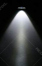 LED flashlight beam on paper.