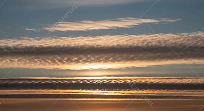 Sunset with clouds in the sky at dusk or dawn