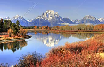 Grand Teton ranges backdrop to fall colors along Snake River, Gr