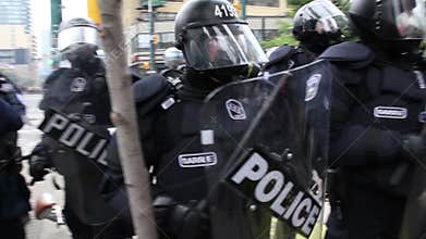 Riot officers in heavy gear closeup - HD 1080p