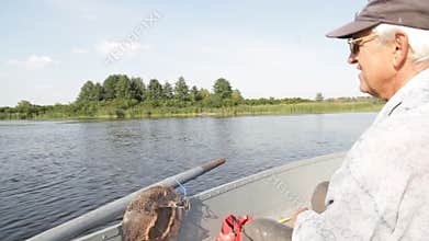 Fisherman fishing on boat
