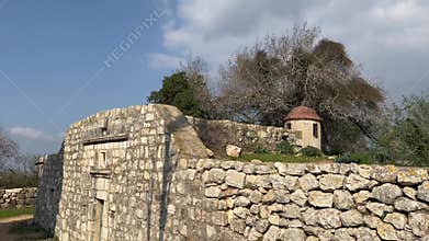 Ancient fortifications and abandoned stone church ruins