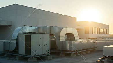 Rooftop HVAC Systems on Commercial Building at Sunset