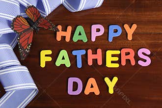 Happy Fathers Day childrens toy block colorful letters spelling greeting