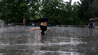 Breakdancer in the rain in Prague