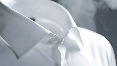 Close Up Of A White Dress Shirt Collar And Upper Chest Area At Daytime