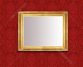 Mirror on red wall