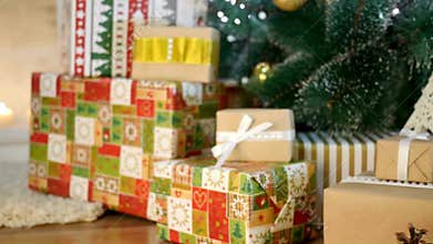 Festive Christmas presents piled under a twinkling tree, anticipation builds