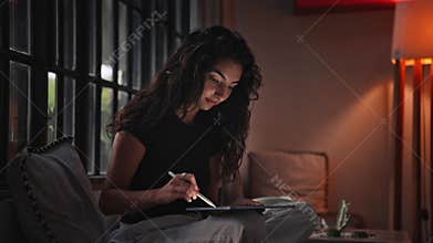 Woman Using Tablet Computer for Art Work and Drawing on Graphics Screen by Pen