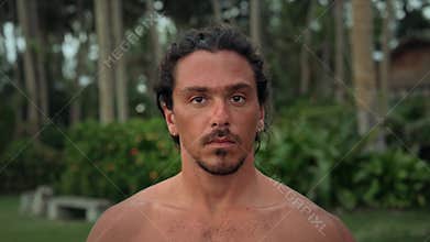 Portrait Of Man Surfer At Island or Person Looking At Camera at Green Nature