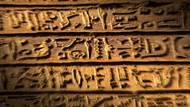 Light spot moving on egypt hieroglyphics