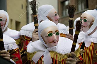 'Gille' wearing traditional wax mask, Binche, Belgium