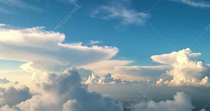 Emphasizing the serene, untouched beauty of a vast open firmament, where only natural elements like clouds and atmospheric