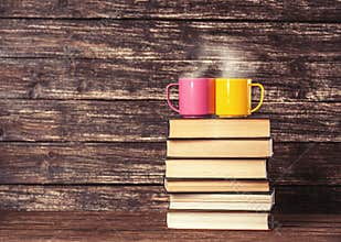 Two cups and books