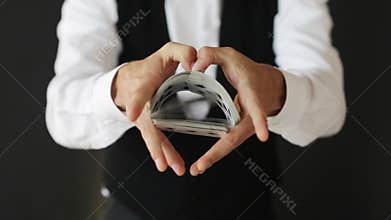 Man showing trick with playing cards