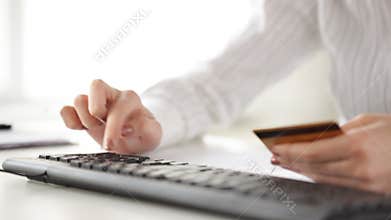 Woman with credit card making internet shopping