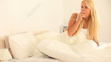 Tired woman waking up